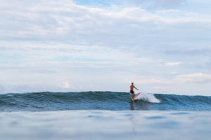 Boy Surfing on an empty wave 