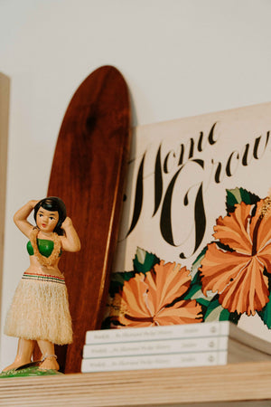 Hula girl and surfboard wood carving 